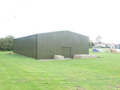 Headquaters of sea scouts, insulated steel building in olive green finish