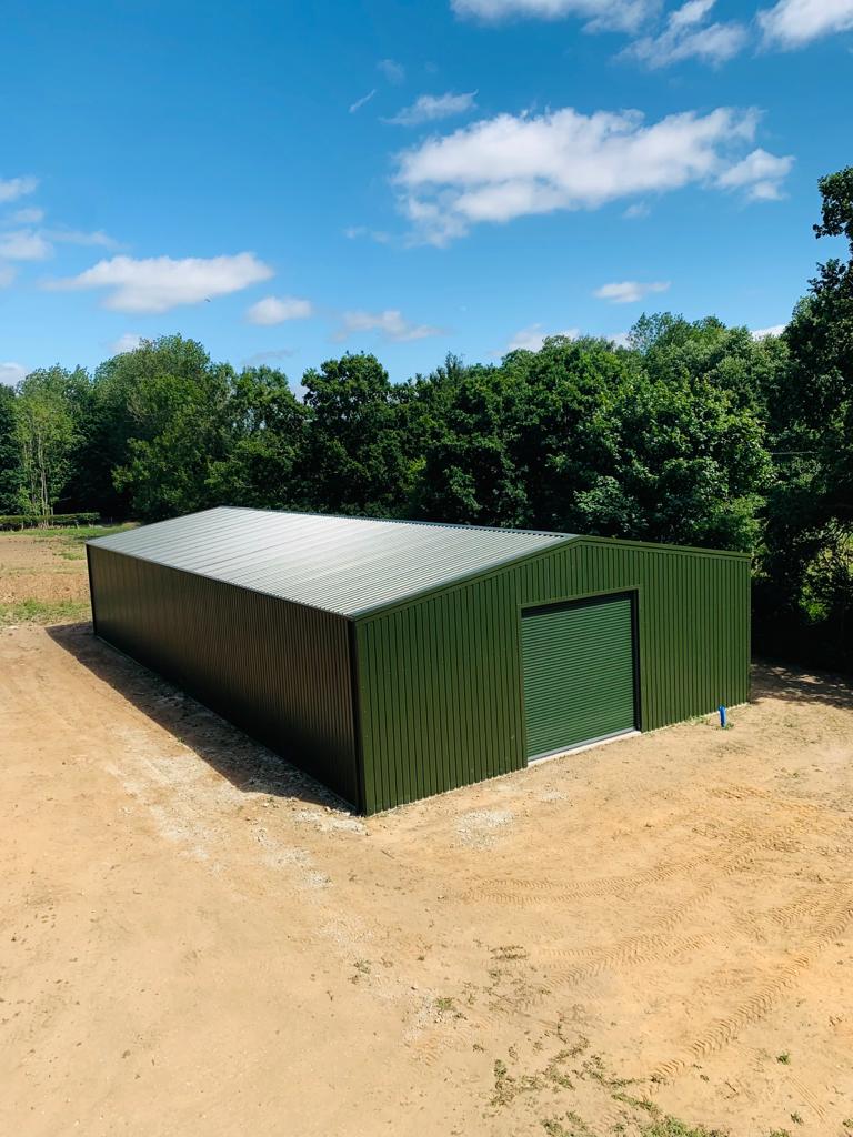Finished agricultural steel building in classic British Green cladding