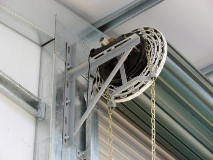 Steel roller door mechanism