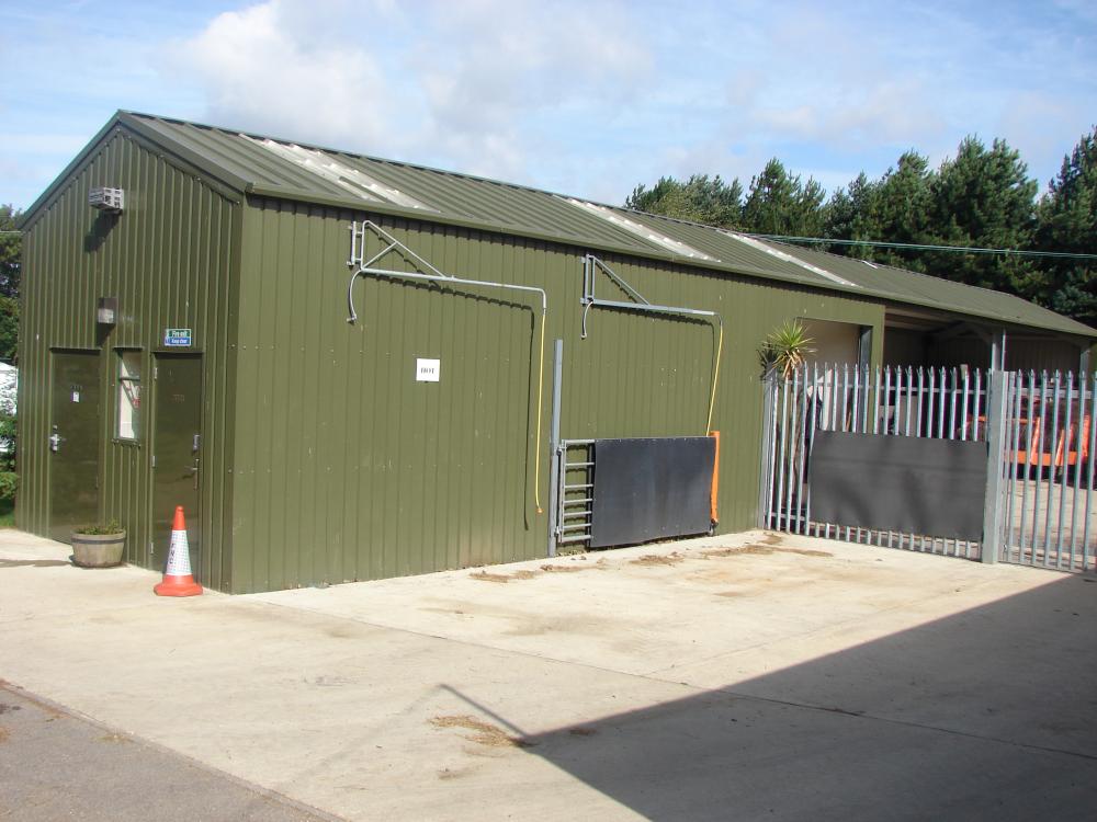 Exterior in olive green with two PA doors