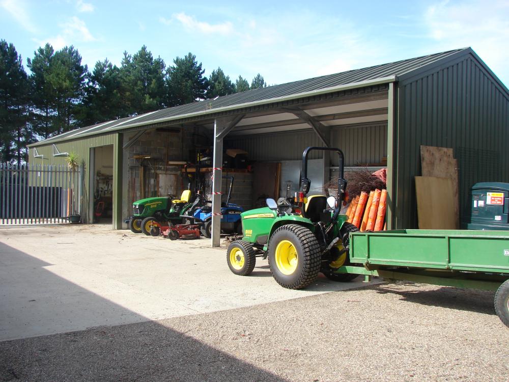 Open steel framed machinery shelter